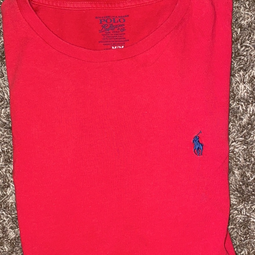 medium red polo shirt